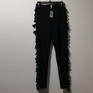 Line6ix tassel leggings sz M color black new with tag